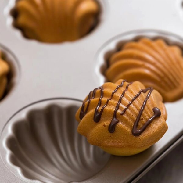 463-1cnnxs.jpg Moule à Madeleines en Acier au Carbone