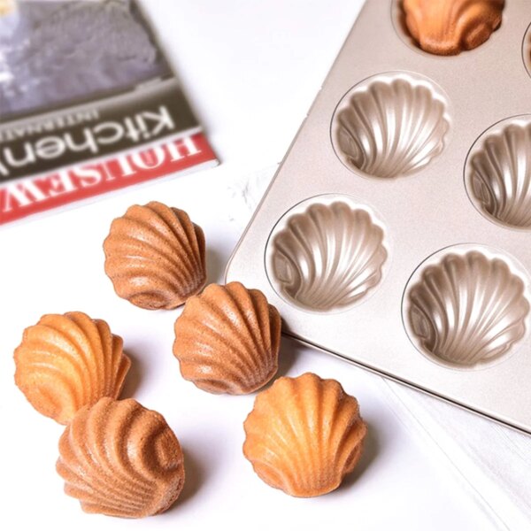 463-y9dayf.jpg Moule à Madeleines en Acier au Carbone